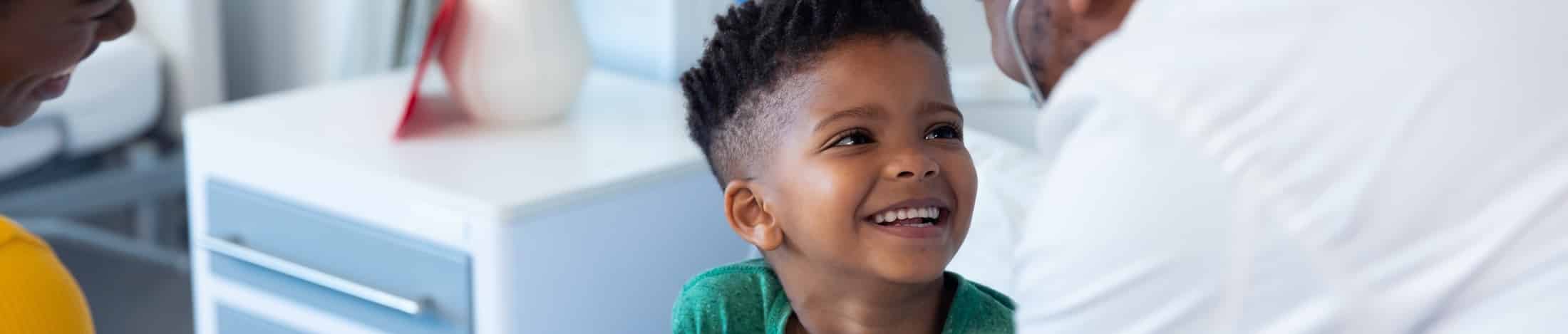 Young boy being treated in consultant outpatient surgery