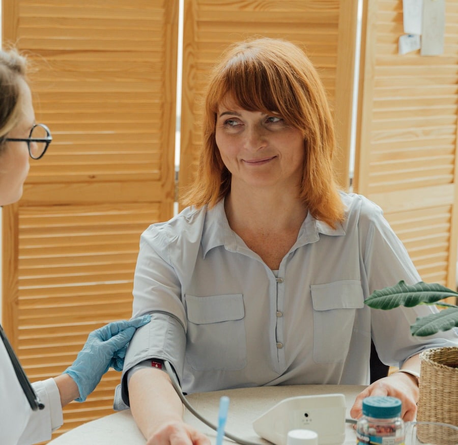 woman having blood pressure
